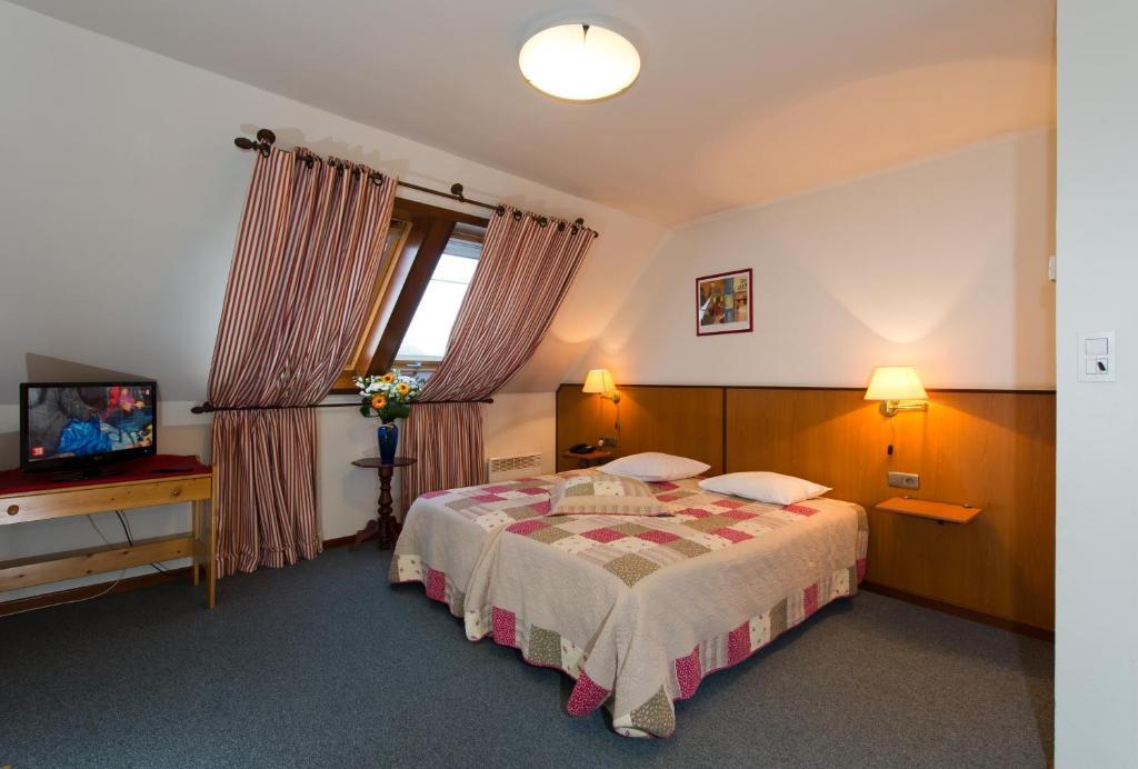 Auberge Le XIX Eme Thulin Номер фото